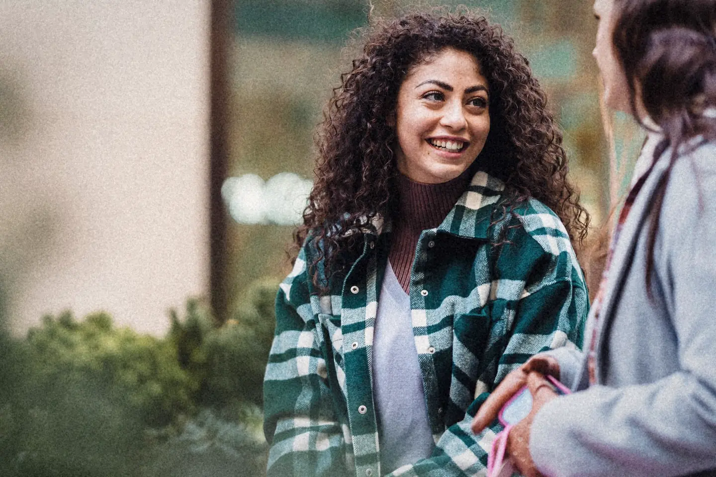 Two women laughing together